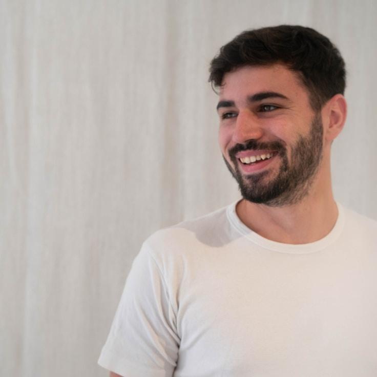 Kaveri Mehta, Lead Design Curator at PulseGardenParcel, reviewing corporate floral arrangements